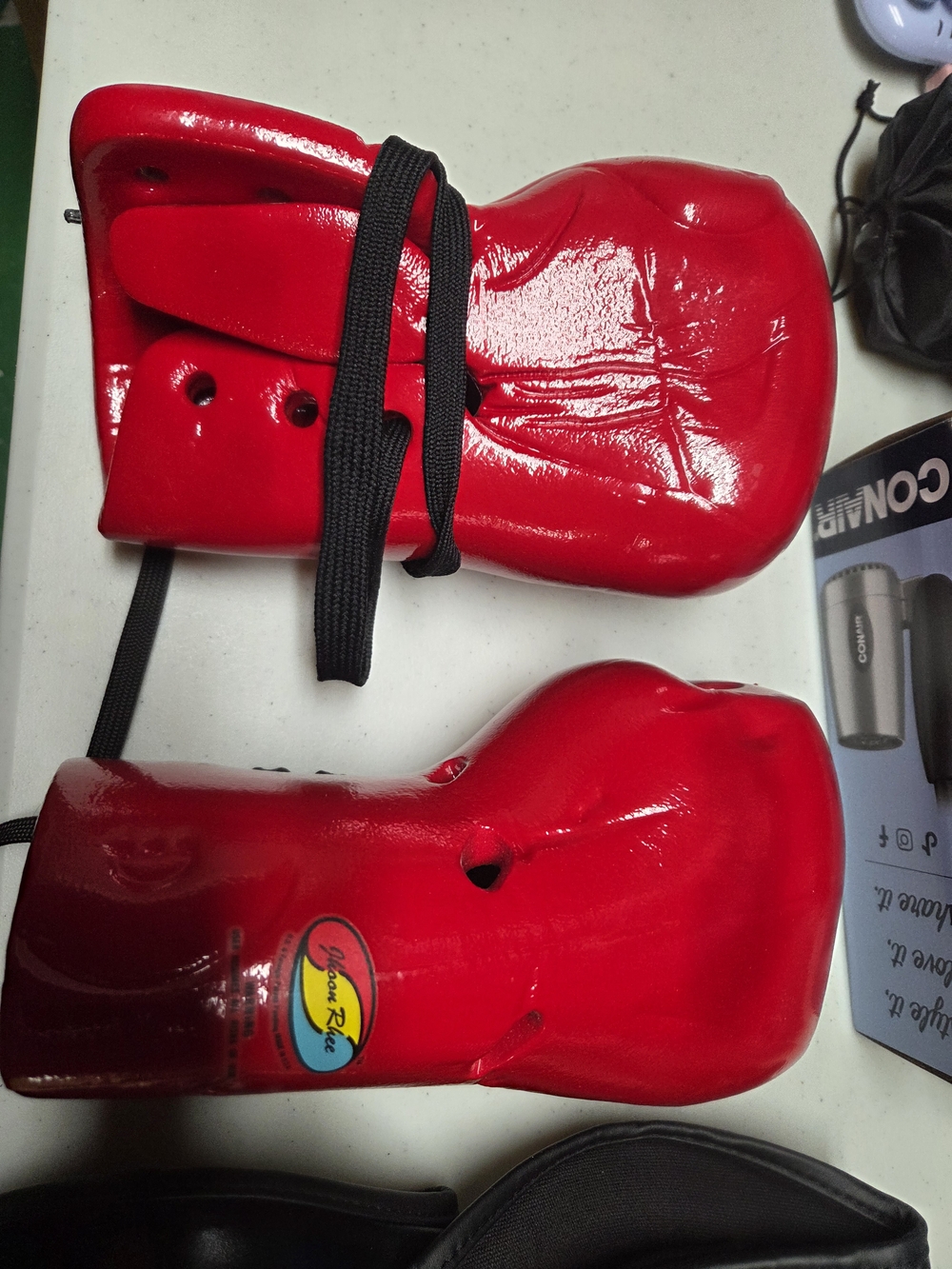 martial arts sparring gloves and shin guards